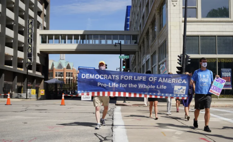 Members of Democrats for Life of America rally outside the Democratic National Convention in Milwaukee in August 2020 (Aaron of L.A. Photography/Shutterstock)