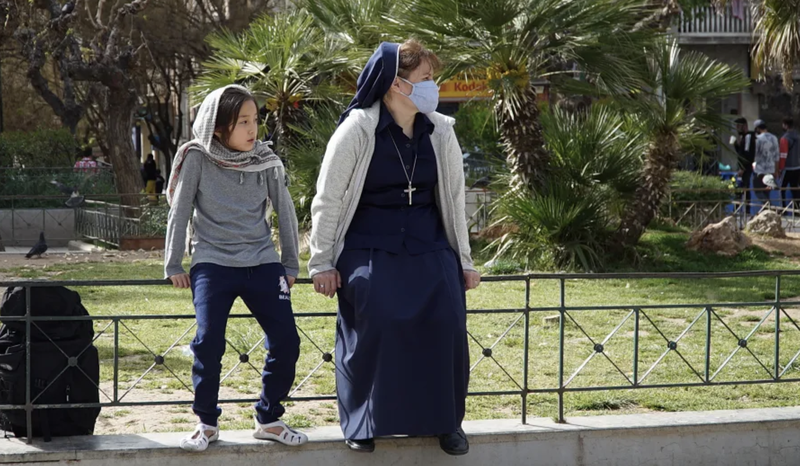 Sr. Victoria Kovalchuk with a refugee girl in Athens, Greece, in April 2021. (Alexey Gotovsky/CNA)
