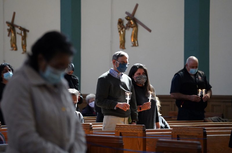 Worshipers at a memorial Mass March 13 for parishioners who have died from COVID-19 at St. John-Visitation Church in the Bronx borough of New York City. (CNS/Gregory A. Shemitz)