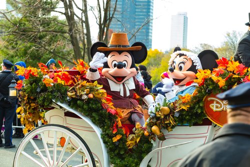 Mickey and Minnie Mouse ride in a carriage in the annual Thanksgiving Day Parade in Philadelphia in 2016. (George Sheldon/Shutterstock)