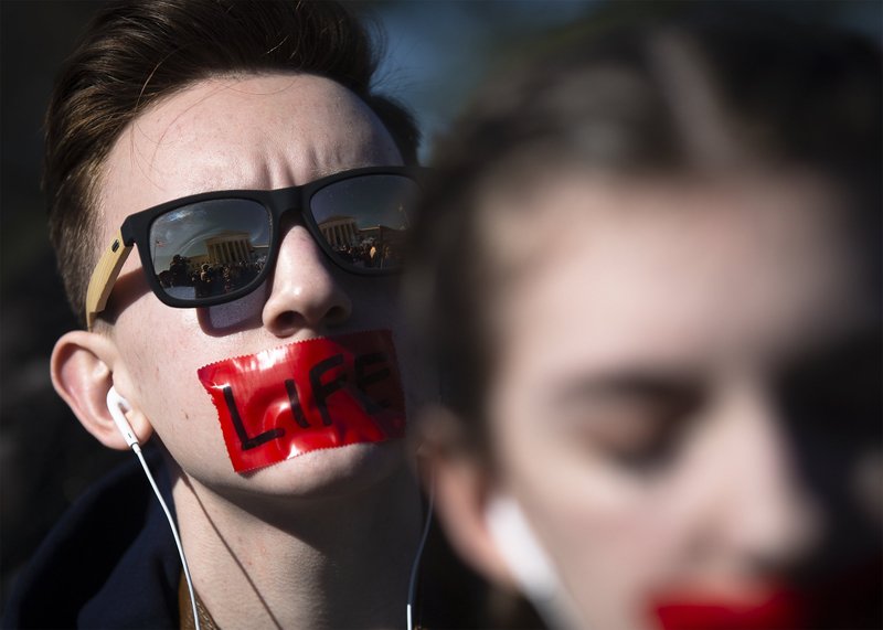 Pro-life activists are seen near the U.S. Supreme Court in Washington March 4, 2020. (CNS photo/Tyler Orsburn)