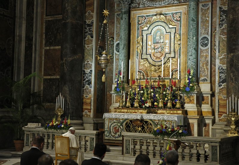 Pope Francis prays the rosary with about 160 people in St. Peter's Basilica at the Vatican May 1, 2021. The pope began a monthlong rosary marathon praying for an end to the COVID-19 pandemic. (CNS photo/Paul Haring)
