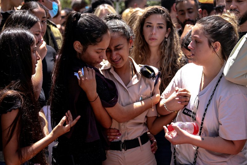 Family and friends mourn in Eliakim, Israel, May 13, 2021, during the funeral of Omer Tabib, an Israeli soldier who was killed during cross-border fighting near Gaza. (CNS photo/Avishag Shar-Yashuv, Reuters)