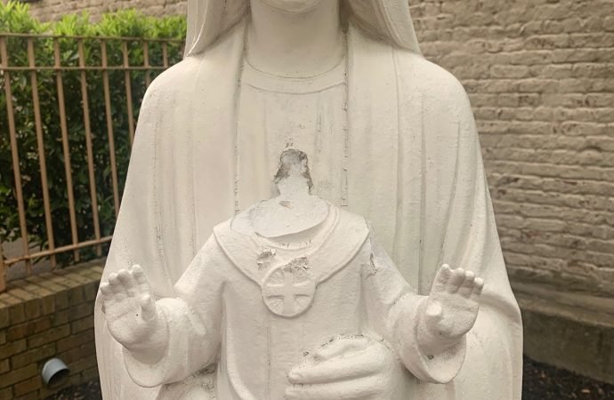 A statue depicting Mary holding Jesus on the grounds of the administrative offices of the Diocese of Brooklyn, N.Y., is seen after it was vandalized sometime during the weekend of May 15 and May 16, 2021. (CNS photo/courtesy Brooklyn Diocese)