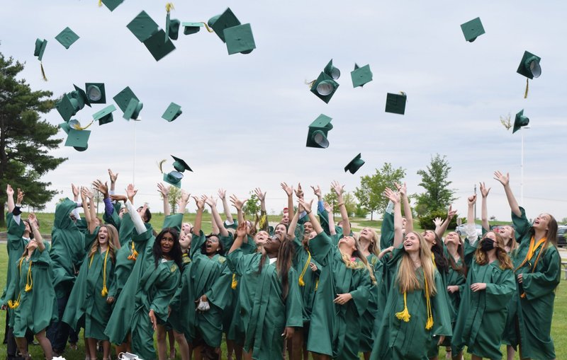 Graduates of the High School of St. Thomas More in Champaign, Ill., celebrate their commencement ceremony May 15, 2021. (CNS photo/Tom Dermody, The Catholic Post)