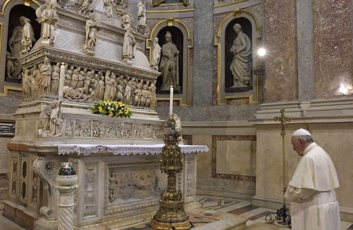 Pope Francis prays at the tomb of St. Dominic at the Cathedral of St. Peter in Bologna, Italy, in this Oct. 1, 2017, file photo. In a message commemorating the 800th anniversary of the death of St. Dominic, the pope said the life of the Spanish saint and his zeal for preaching the Gospel serve "as an inspiration to all the baptized." (CNS photo/Vatican Media)