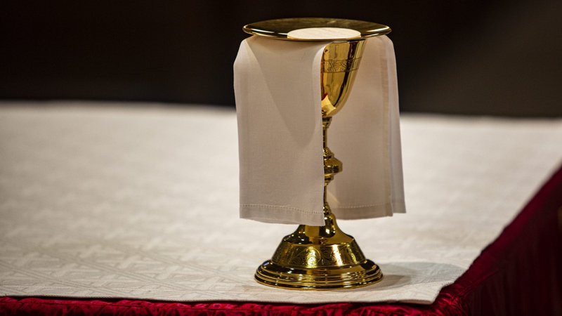 The Eucharist rests on a paten on the altar in the Cathedral of St. Peter in Wilmington, Del., May 27, 2021. (CNS photo/Chaz Muth)