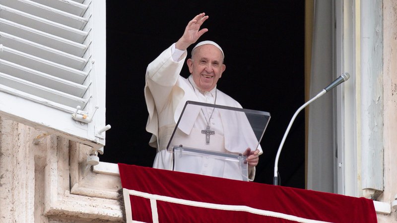 Pope Francis greets the crowd as he leads the Angelus from the window of his studio overlooking St. Peter's Square at the Vatican June 6, 2021. (CNS photo/Vatican Media)