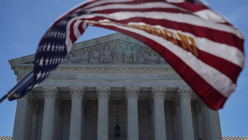 A U.S. flag flies in front of the Supreme Court in Washington June 25, 2018. (CNS photo/Toya Sarno Jordan, Reuters)