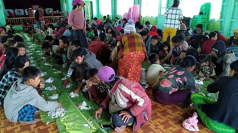 People displaced by fighting in northwestern Myanmar eat at a shelter in Chin state May 31, 2021. Thousands of people have taken refuge in churches and convents as Myanmar's military continues to fight local resistance forces. (CNS photo/Reuters)