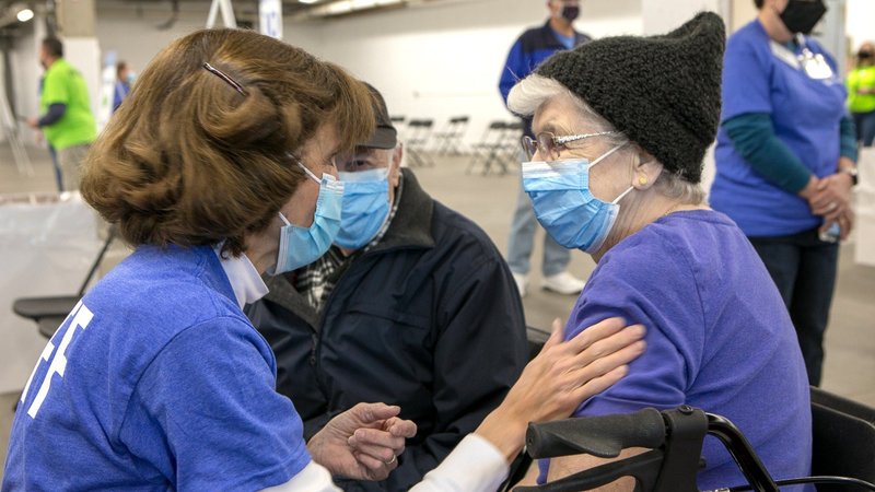 SCL Health staff administer COVID-19 vaccines to vulnerable seniors and members of underserved communities Feb. 6, 2021, at the National Western Complex in Denver. SCL is a Catholic health care system based in Broomfield, Colo. During their virtual assembly June 14-15, leadership of the Catholic Health Association stressed the need to continue to promote COVID-19 vaccines for everyone. (CNS photo/courtesy Gregg Moss, SCL Health)