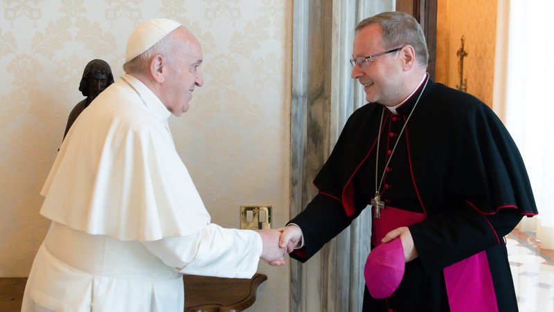 Pope Francis greets Bishop Georg Bätzing, president of the German bishops' conference, during an audience at the Vatican June 24, 2021. Bishop Bätzing said he assured the pope that German Catholics do not want to split from the church. (CNS photo/Vatican Media)