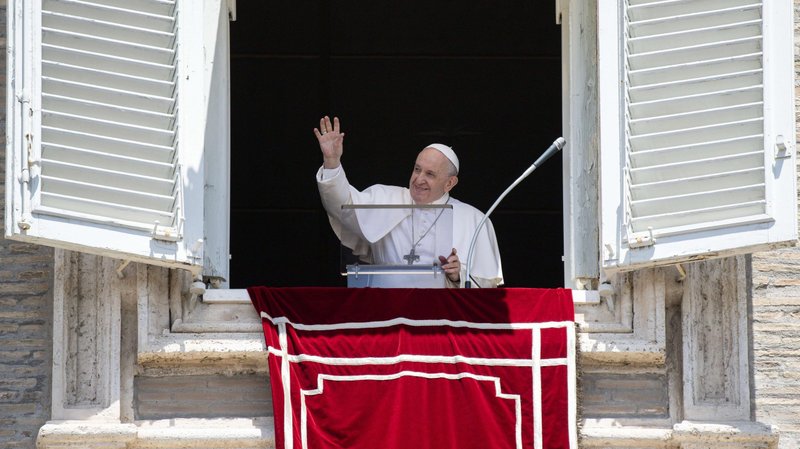 Pope Francis greets the crowd as he leads the Angelus from the window of his studio overlooking St. Peter's Square at the Vatican June 28, 2021. (CNS photo/Vatican Media)