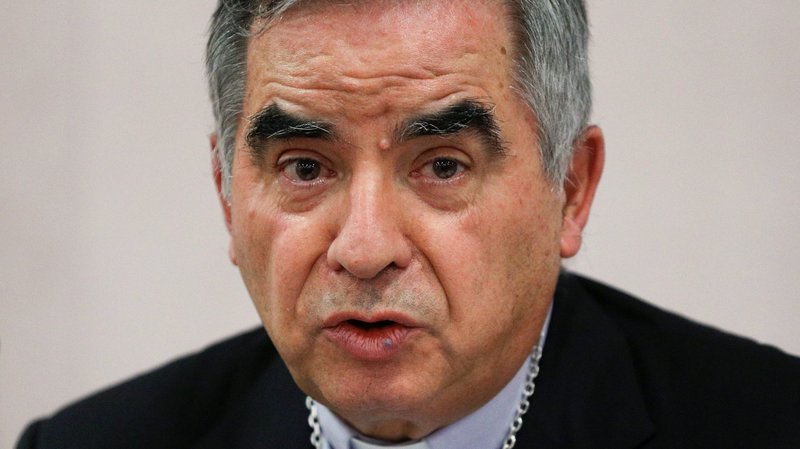 Cardinal Angelo Becciu speaks with journalists during a news conference in Rome Sept. 25, 2020, after he was asked by Pope Francis to resign as prefect of the Congregation for Saints' Causes. On July 3, 2021, the Vatican announced Cardinal Becciu and nine other individuals and entities were indicted on charges ranging from embezzlement to money laundering and abuse of office. (CNS photo/Guglielmo Mangiapane, Reuters)