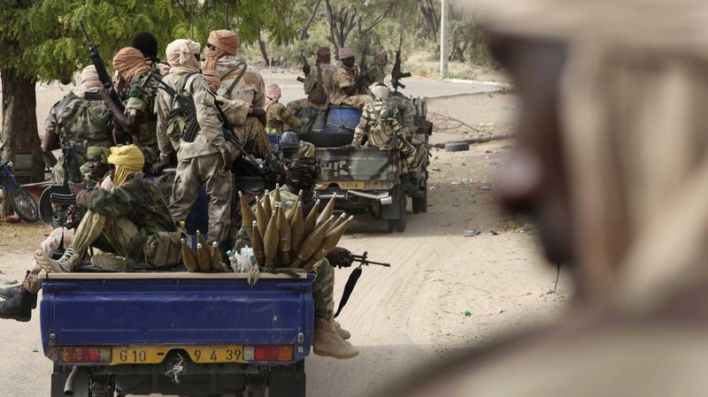Soldiers from Chad drive in the retaken town of Damasak, Nigeria, March 18, 2015. Armies from Nigeria, Cameroon, Chad and Niger launched an offensive to end Boko Haram's six-year campaign, which has killed thousands in northern Nigeria and spilled over into Cameroon and Niger. (CNS photo/Emmanuel Braun, Reuters)