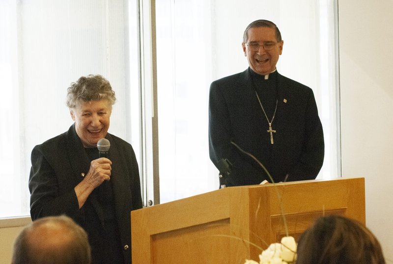 Longtime Tidings employee Hermine Lees was joined by then-Archbishop Cardinal Roger Mahony at "Hermine Lees Recognition Day" on Dec. 2, 2007. (Victor Alemán)
