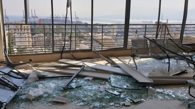A room with a view of the the port of Beirut at Lebanese Hospital Geitaoui is littered with debris in the aftermath of the blast Aug. 4, 2020. The hospital, entrusted to the Maronite Sisters of the Holy Family, received 350 injured wounded people following the disaster. Catholic Near East Welfare Association has helped to rebuild the hospital. (Courtesy Geitaoui Hospital/CNS via Crux)