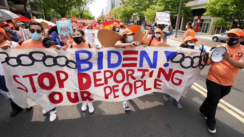 Immigration advocates hold a demonstration near the White House in Washington April 28, 2021, calling on President Joe Biden to secure a path to citizenship for immigrants living in the country illegally. (CNS photo/Kevin Lamarque, Reuters)