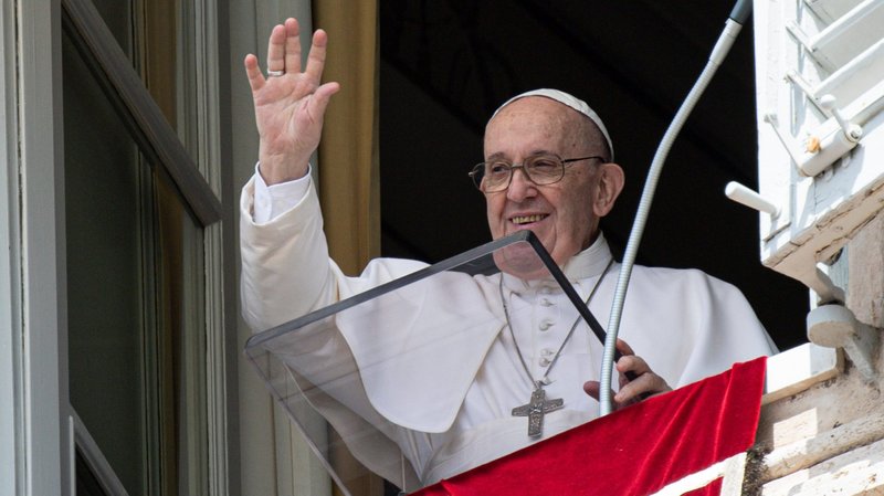 Pope Francis greets the crowd as he leads the Angelus from the window of his studio overlooking St. Peter's Square at the Vatican Aug. 1, 2021. In his Angelus message, the pope said people should seek Jesus out of genuine love, not calculated self-interest. (CNS photo/Vatican Media)