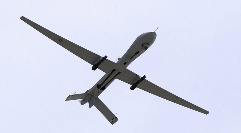 A U.S. Air Force MQ-1 Predator, an unmanned aerial vehicle armed with AGM-114 Hellfire missiles, performs a low altitude pass during an air show at Nellis Air Force Base in Nevada Feb. 6, 2013. (CNS photo/U.S. Air Force Airman 1st Class Jeffrey Hall, U.S. Air Force handout via Reuters) NO ARCHIVES. MUST DISCARD 30 DAYS AFTER DOWNLOAD.