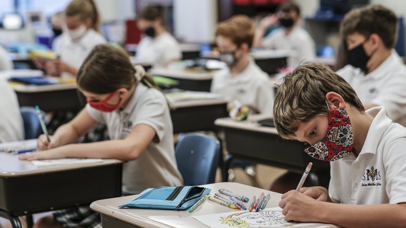 Students work at their desks on the first day of the new school year at St. Matthew School in Franklin, Tenn., Aug. 6, 2020, with extensive COVID-19 protocols in place, including temperature screening and mandatory face masks for each student. In Louisiana, the attorney general opposes Catholic schools' mask mandate put in place as the new 2021-2022 school year begins. (CNS photo/Rick Musacchio, Tennessee Register)