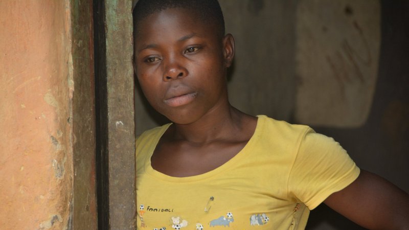 A young woman in distress is pictured after dropping out of school in Mbale, Uganda, Nov. 17, 2018. Girls and women in Uganda and other African countries are facing gender-based violence caused by poverty, cultural norms and practices, poor infrastructure, violence and fragility. (CNS photo/Tonny Onyulo)