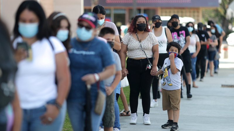 People in Los Angeles wait in line for a COVID-19 test at a back-to-school clinic Aug. 12, 2021. (CNS photo/Lucy Nicholson, Reuters)