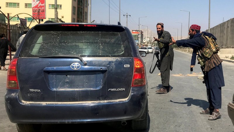 Members of Taliban forces gesture as they check a vehicle on a street in Kabul, Afghanistan, Aug. 16, 2021. During his Angelus address Aug. 15, Pope Francis expressed his concern for Afghanistan amid the Taliban's control of the country. (CNS photo/Reuters)