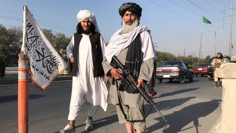 Taliban fighters stand outside the Interior Ministry in Kabul, Afghanistan, Aug. 16, 2021. During his Angelus address Aug. 15, Pope Francis expressed his concern for Afghanistan amid the Taliban's control of the country. (CNS photo/Reuters)