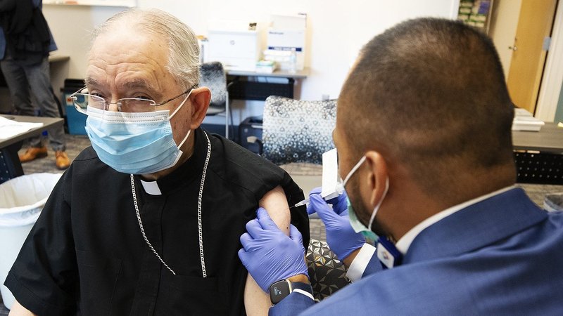 Archbishop José H. Gomez of Los Angeles, president of the U.S. Conference of Catholic Bishops, receives his first dose of the Pfizer COVID-19 vaccine at Providence St. John's Health Center in Santa Monica, Calif., Jan. 21, 2021. (Victor Aleman, Angelus News)