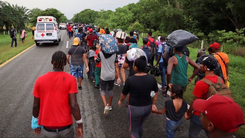 Migrants from Central America and the Caribbean walk in a caravan near Escuintla, Mexico, Aug. 29, 2021. They were headed to Mexico City to apply for asylum and refugee status. (CNS photo/Jose Torres, Reuters)