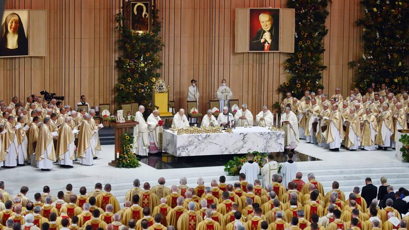 Members of the clergy pray during the beatification ceremony of Cardinal Stefan Wyszynski and Mother Elisabeth Rosa Czacka in the Church of Divine Providence in Warsaw, Poland, Sept. 12, 2021. (CNS photo/Grzegorz Galazka)