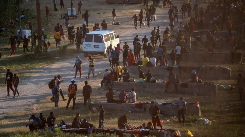Migrants in Del Rio, Texas, rest near the International Bridge between Mexico and the U.S. Sept. 16, 2021. (CNS photo/Go Nakamura, Reuters)