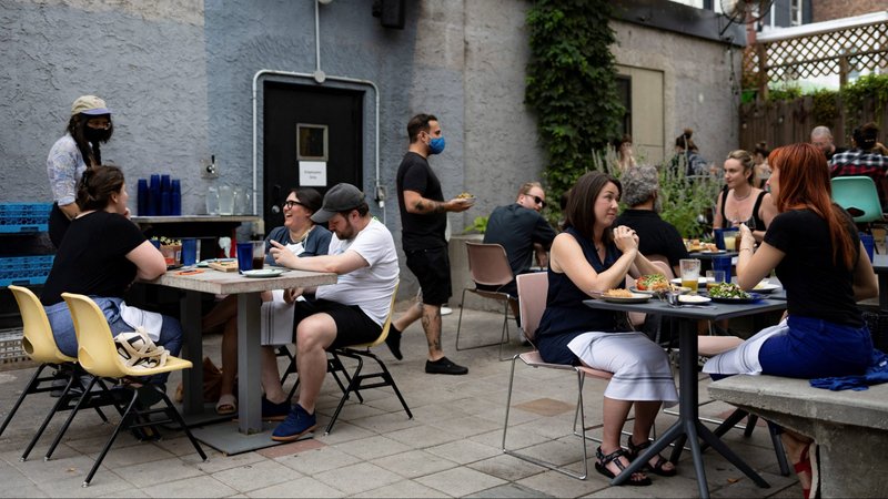 People in Philadelphia eat at a restaurant Aug. 7, 2021, amid the coronavirus pandemic. (CNS photo/Hannah Beier, Reuters)