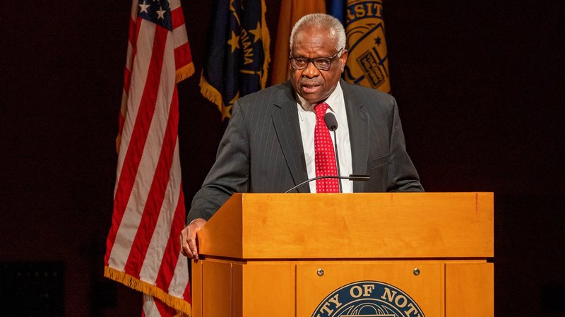 U.S. Supreme Court Justice Clarence Thomas delivers the 2021 Tocqueville Lecture Sept. 16 at the University of Notre Dame in Indiana. "We are all aware of those who assert that America is a racist and irredeemable nation," he said. "But there are many more of us, I think, who feel that America is not so broken as it is adrift at sea." Thomas also said the court doesn't make decisions based on politics or public opinion and warned against "destroying our institutions" when "they don't give us what we want when we want it." (CNS photo/Peter Ringenberg, courtesy University of Notre Dame)