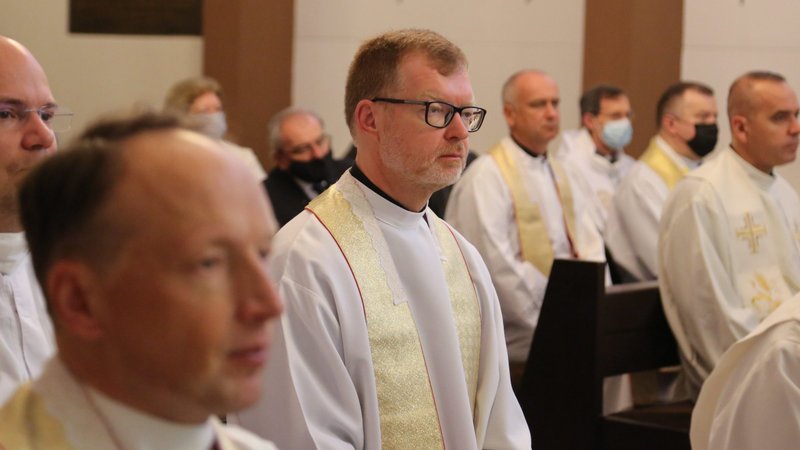 Jesuit Father Hans Zollner, center, a member of the Pontifical Commission for the Protection of Minors, is seen at a conference of church representatives and child protection experts in Warsaw, Poland, Sept. 20, 2021. Pope Francis in a message to the conference called on bishops to recognize mistakes in their handling of sexual abuse and to convert sorrow into "concrete pathways of reform." (CNS photo/courtesy EpiskopatNews)