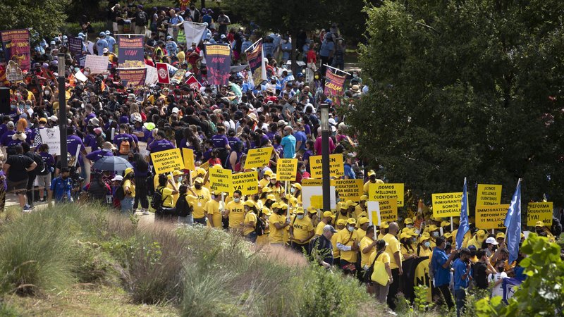 Migrant families and immigration advocates in Washington call for a pathway toward U.S. citizenship as they march toward the U.S. Immigration and Customs Enforcement building Sept. 21, 2021. (CNS photo/Tyler Orsburn)