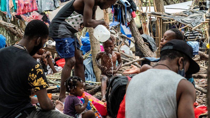 Migrants are seen at a makeshift camp in Del Rio, Texas, Sept. 21, 2021. (CNS photo/Go Nakamura, Reuters)