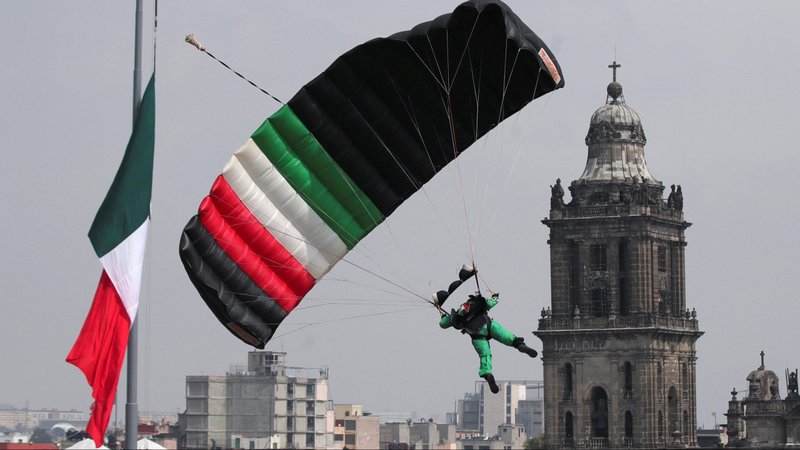 A paratrooper participates in the traditional military parade to mark the bicentennial of Mexico's Independence from Spain at Zocalo square in Mexico City Sept. 16, 2021. (CNS photo/Henry Romero, Reuters)