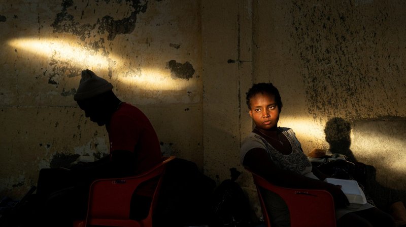 Migrants seeking asylum in the U.S., who returned to Mexican side of the border to avoid deportation, take shelter in Ciudad Acuna, Mexico, Sept. 24, 2021. (CNS photo/Go Nakamura, Reuters)