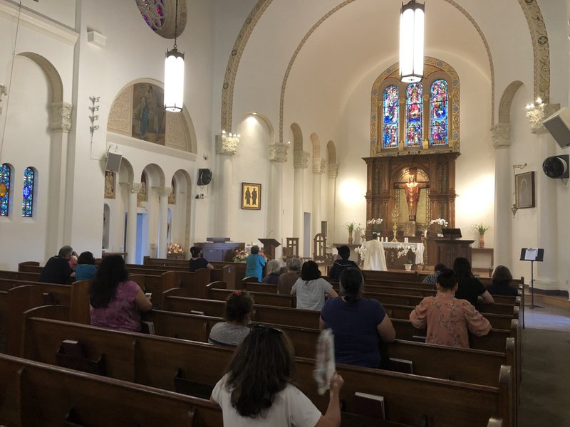 Father Juan Ochoa leads worshippers in prayer during the 40 hours of adoration at Christ the King Church in Hancock Park, one of the 22 churches chosen as pilgrimage sites. (Archdiocese of LA)