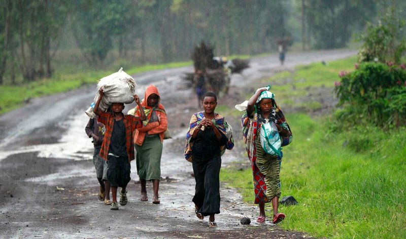 Displaced people are seen in a file photo along a road near Goma, Congo. (Thomas Mukoya/Reuters via CNS)
