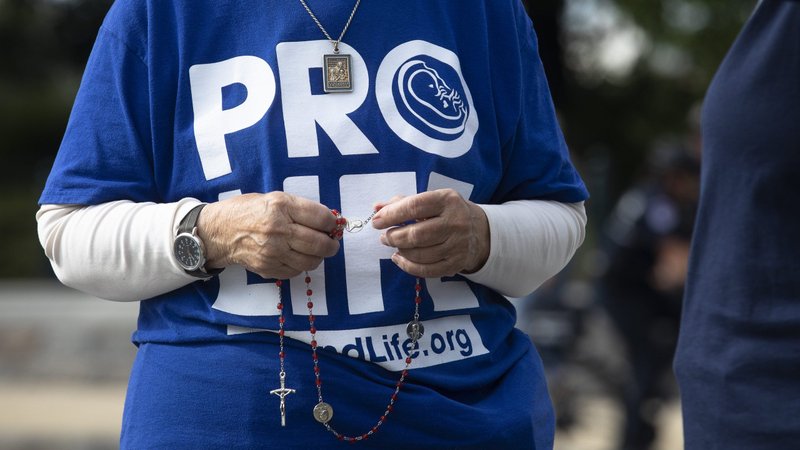 Pro-life advocates are seen near the U.S. Supreme Court building in Washington Oct. 4, 2021, the first day of the high court's new term. (CNS photo/Tyler Orsburn)
