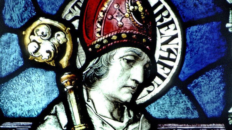 The likeness of St. Irenaeus of Lyon is pictured in a stained-glass window at the Basilica of Our Lady Immaculate in Guelph, Ontario. During an Oct. 7, 2021, meeting with members of the St. Irenaeus Joint Orthodox-Catholic Working Group, Pope Francis said he will soon declare St. Irenaeus a doctor of the church. (CNS photo/The Crosiers)