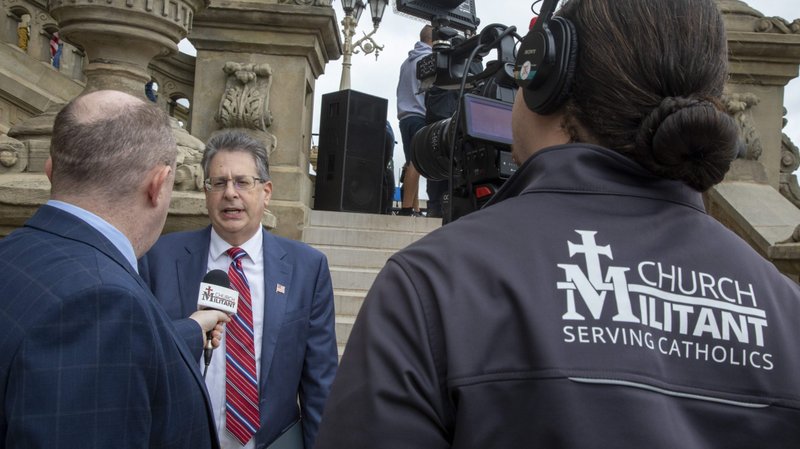 A reporter with Church Militant, also known as St. Michael's Media, interviews Matt DePerno, candidate for Michigan attorney general, Oct. 12, 2021, in Lansing, Mich. (CNS photo/Jim West)