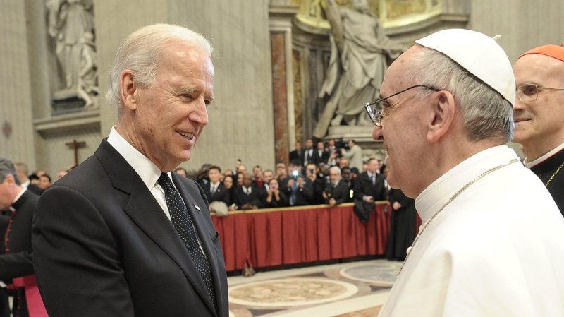 Pope Francis greets then-U.S. Vice President Joe Biden in St. Peter's Basilica at the Vatican March 19, 2013, as the new pontiff receives dignitaries following his inaugural Mass. The pope and President Biden are scheduled to meet at the Vatican Oct. 29, 2021. (CNS photo/Vatican Media)