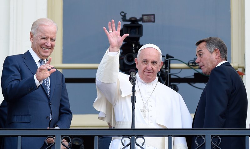 In this Sept. 24, 2015, file photo Pope Francis, flanked by Vice President Joe Biden and House Speaker John Boehner of Ohio, waves to the crowd on Capitol Hill in Washington as they stand on the Speaker's Balcony on Capitol Hill, after the pope addressed a joint meeting of Congress inside. (Susan Walsh/AP via Crux)