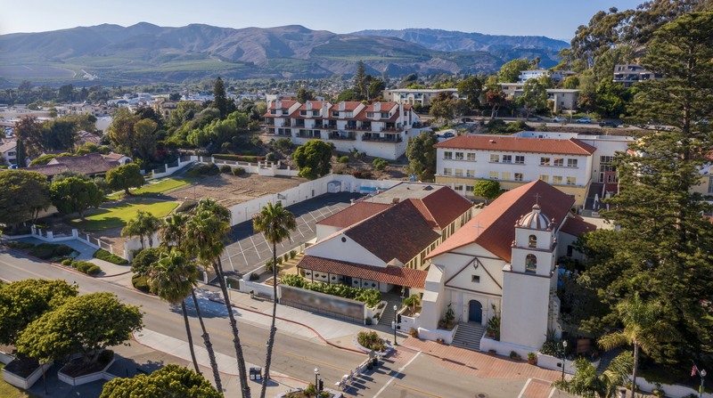 A building now used to house the parish offices of Mission Basilica San Buenaventura (lower center, to the left of the church) was built over an abandoned Chumash cemetery a century ago. (Shutterstock)