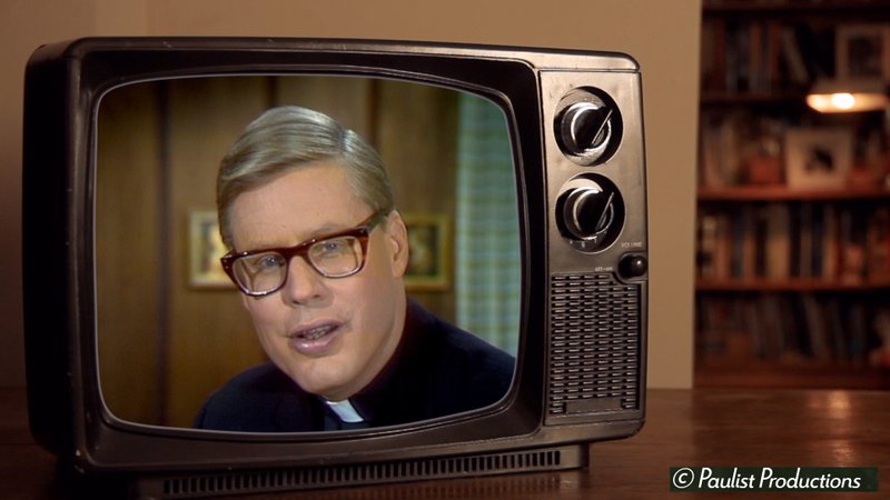 Father Ellwood “Bud” Kieser on a TV in “Hollywood Priest: The Story of Fr. ‘Bud’ Kieser.” (Paulist Productions)