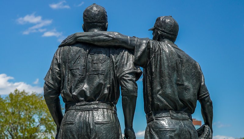 A statue of Jackie Robinson and Pee Wee Reese in front of MCU ballpark in Brooklyn. (Leonard Zhukovsky/Shutterstock)